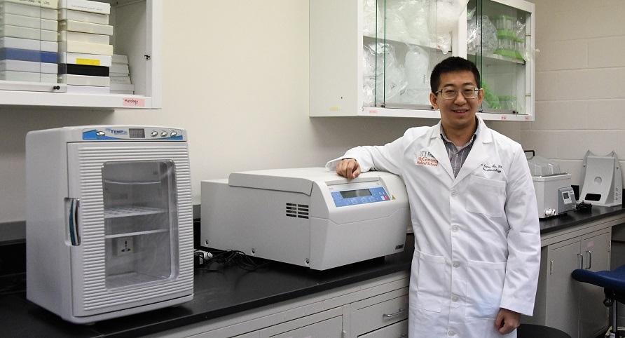 Dr. Aaron An in his lab