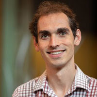 Headshot Portrait of Eric Gibbs
