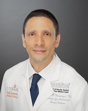 Carlos R. Manrique Neira, MD