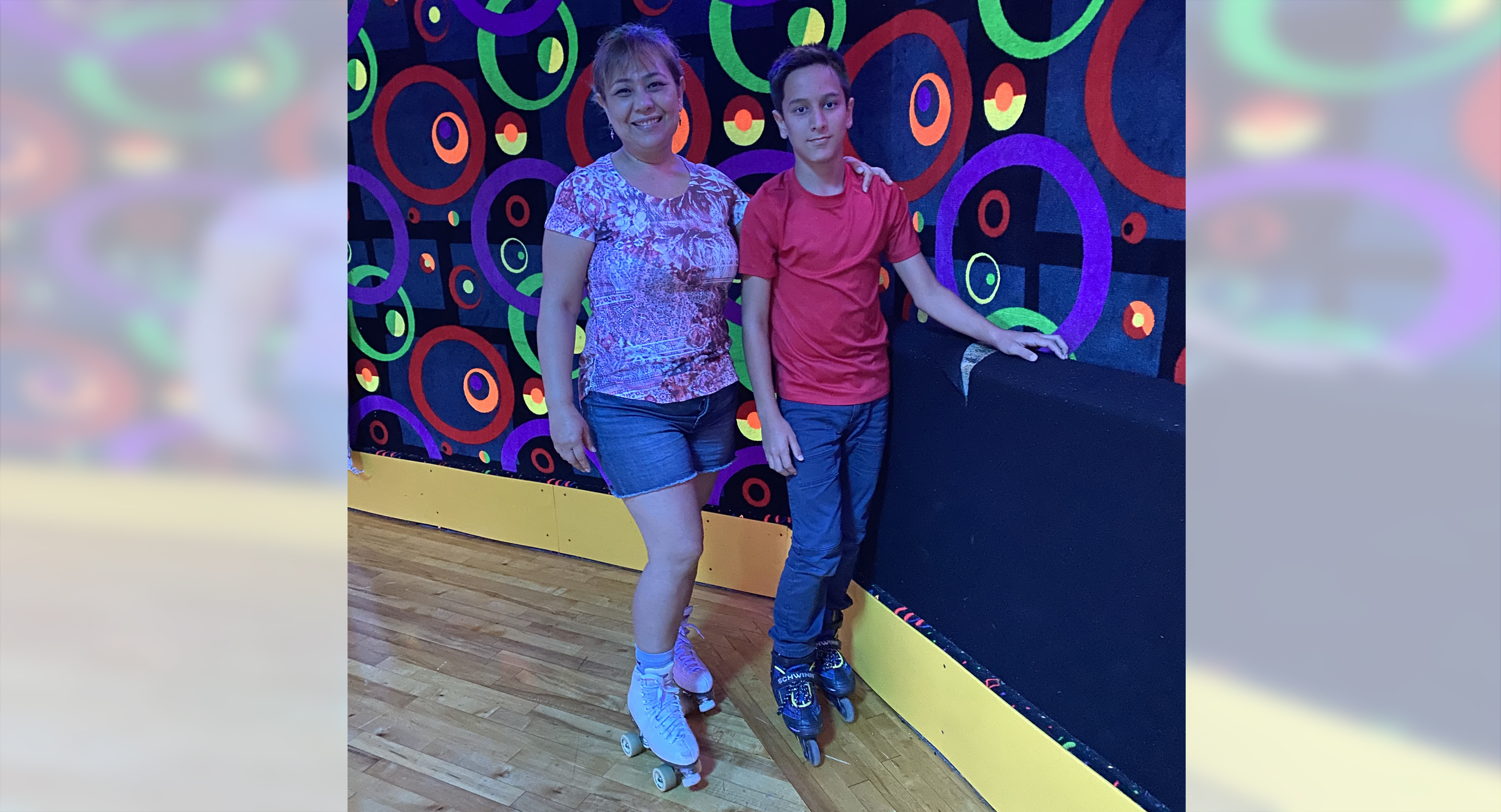 Brenda and her son rollerblading after Brenda receives treatment from k. keyhani