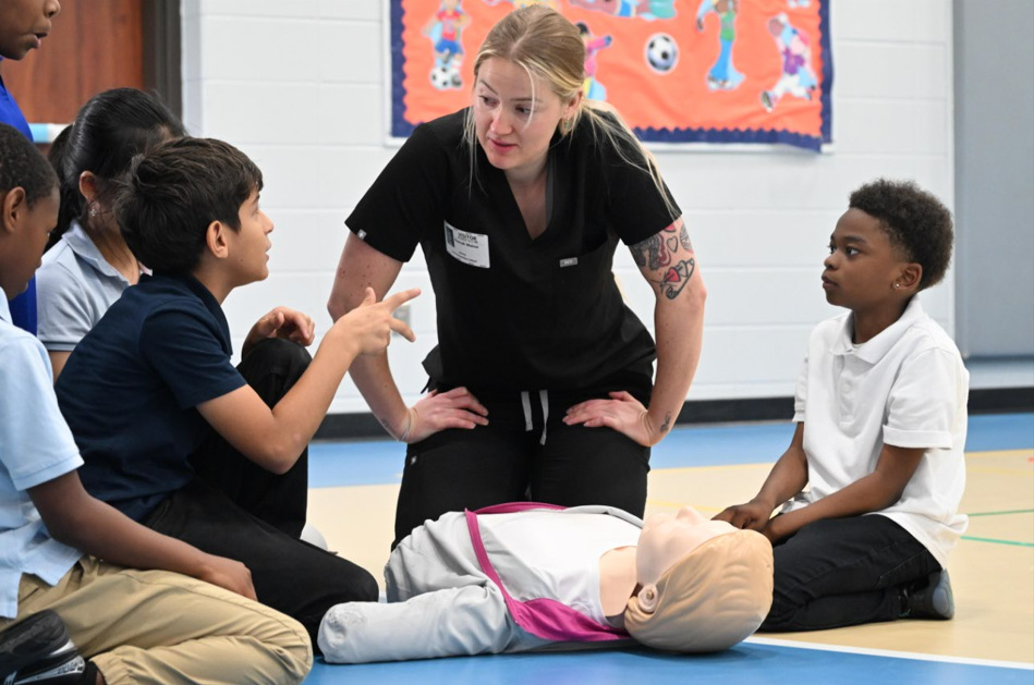 Hannah Mainor CPR w/ students