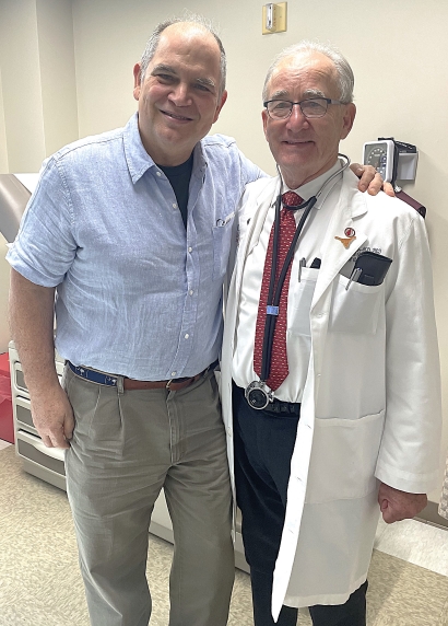 Dr. Richard W. Smalling with a patient