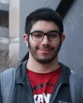 A white man wearing a pair of glasses