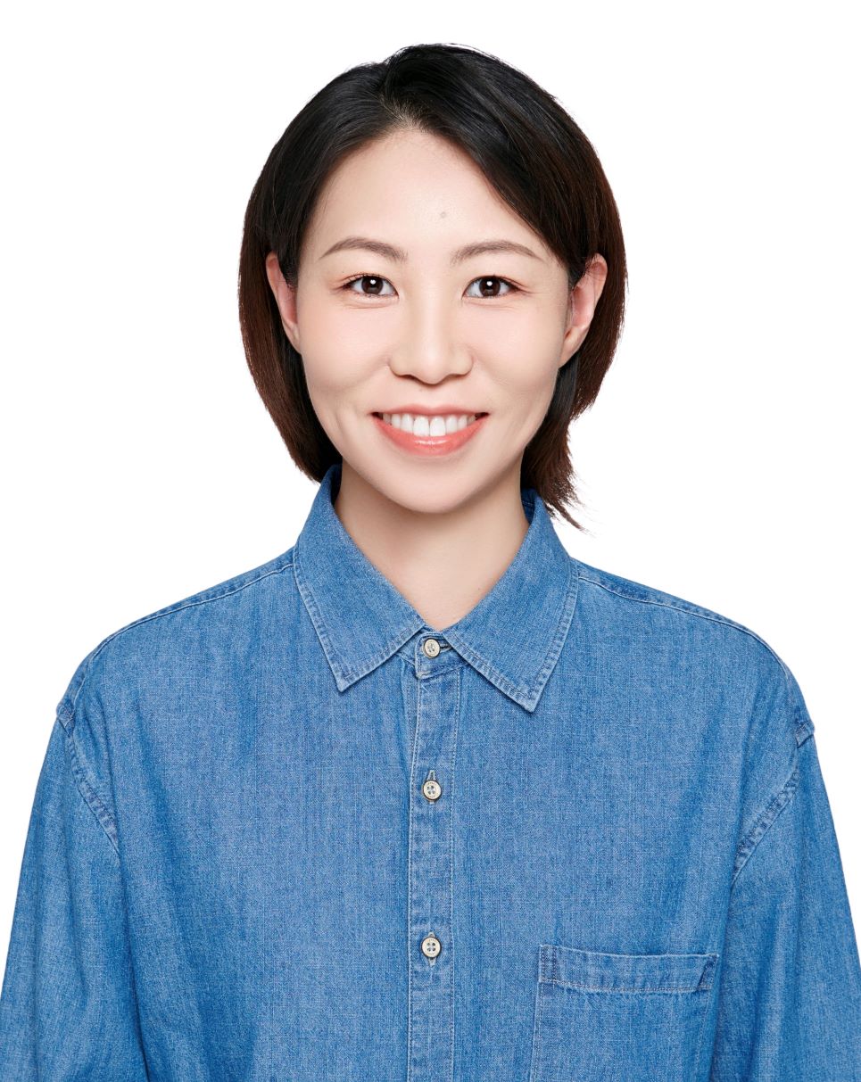 A short hair woman in a blue shirt