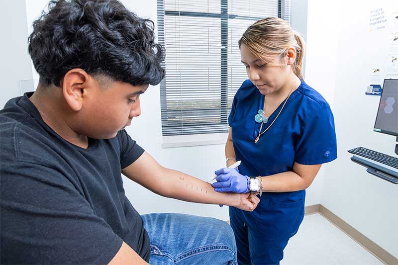 Two People in a clinic setting