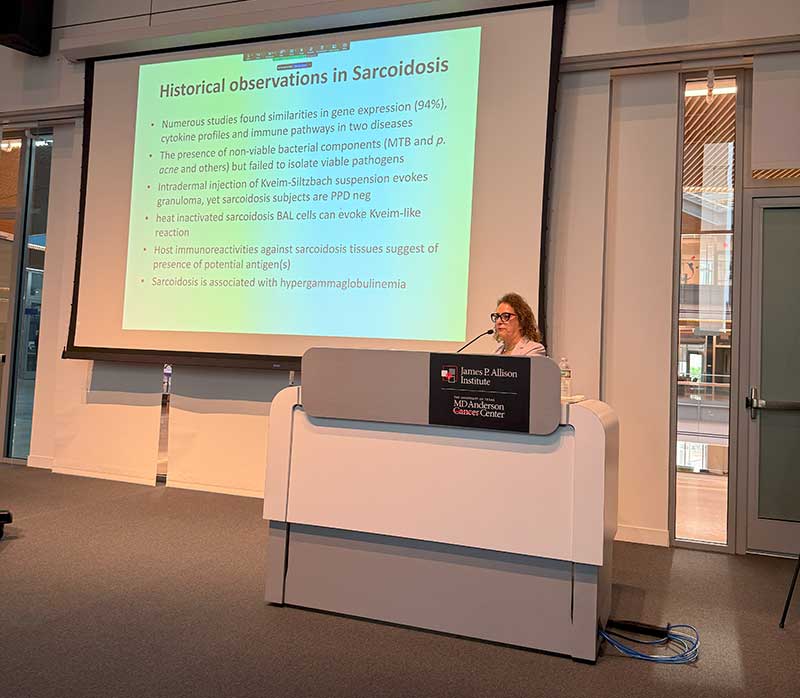 Sarcoidosis Symposium 2025 - Speaker at Podium