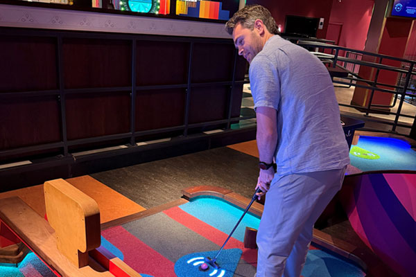 Fellows at putt-putt