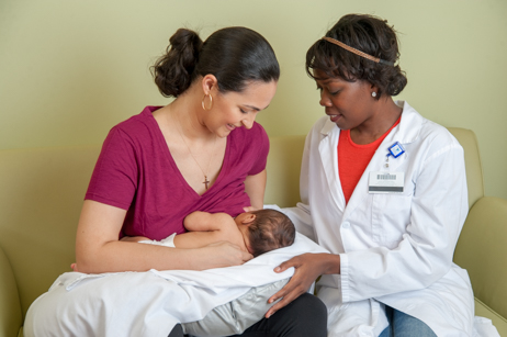 lactation consultants with mom and baby