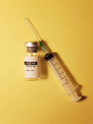 Vaccine needle and vial of medicine