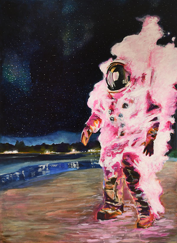 Pink astronaut walks on beach