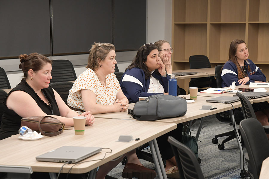 Center members attend talk