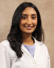 Headshot of Numa Dhuka