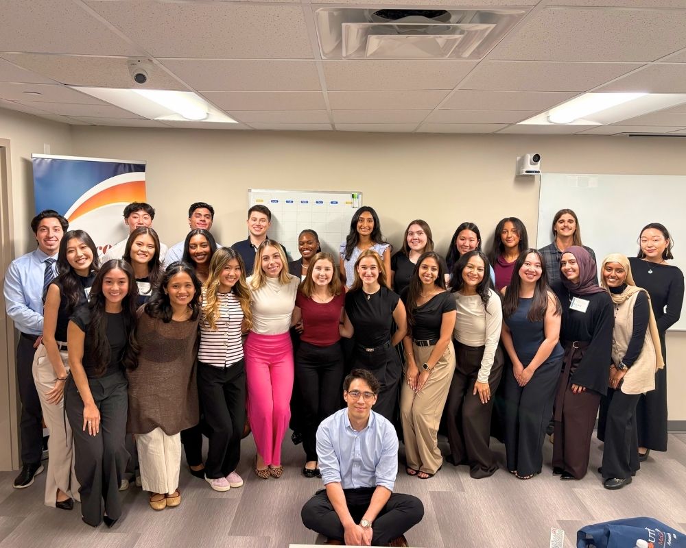 program director, charlie phung, caa, poses with the students of incoming class of 2028