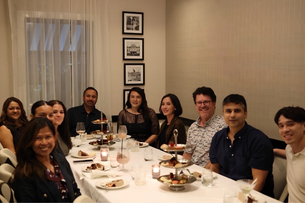 msa program leadership, faculty and staff pose at the dinner table of la friglia