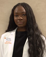 Headshot of Eniola Olaosebikan