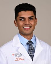 Headshot of a resident smiling at the camera