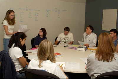 A group of students using a study room.