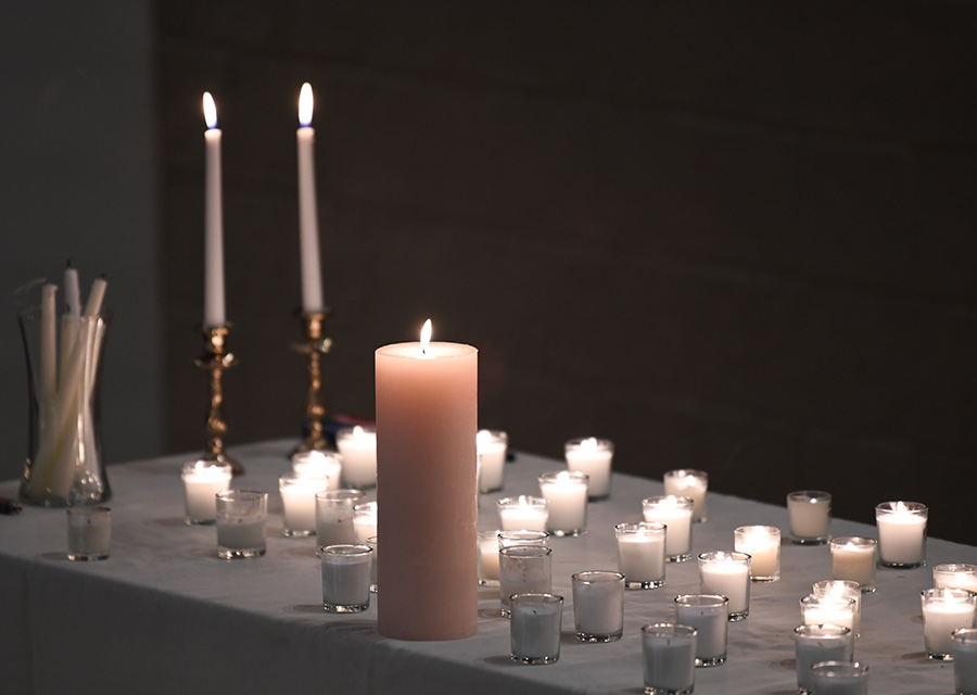 Table setting with candles at the cadaver memorial.