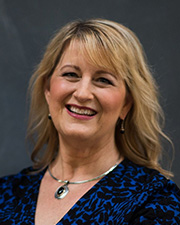 portrait of Deanna Hoelscher, PhD, RDN, LD, CNS, FISBNPA