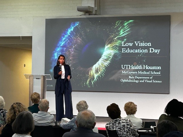 Dr. Love speaking at the 2025 low vision education day