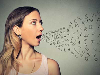 woman speaks alphabet