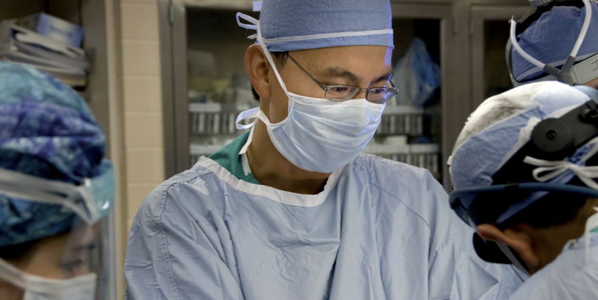 Tang Ho, MD, in surgery