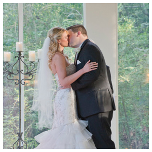 bride and groom kissing