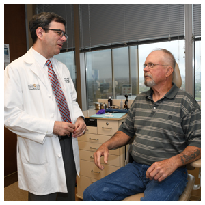 Martin J. Citardi, MD, and Norman Theeck