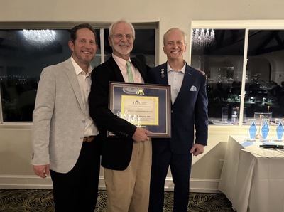 From left: Joshua Gary, MD; 2025 OTA Lifetime Achievement Award recipient Andrew Burgess, MD; and Douglas W. Lundy, MD, FIOTA, at the Orthopaedic Trauma Association meeting.
