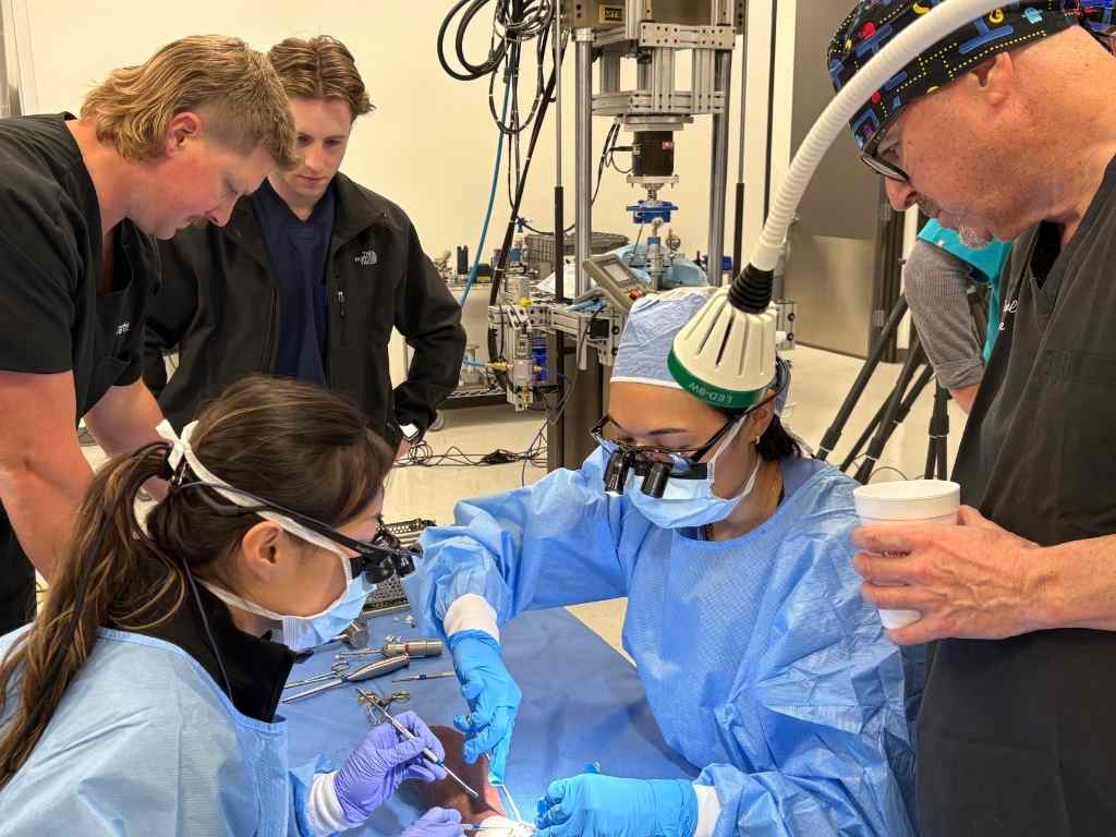 UTHealth Houston hand surgeons practice a new thumb CMC arthritis procedure during hands-on training. From left: Joanne Zhou, MD; Hannah Dineen, MD; and visiting surgeon Adil Trabelsi, MD.