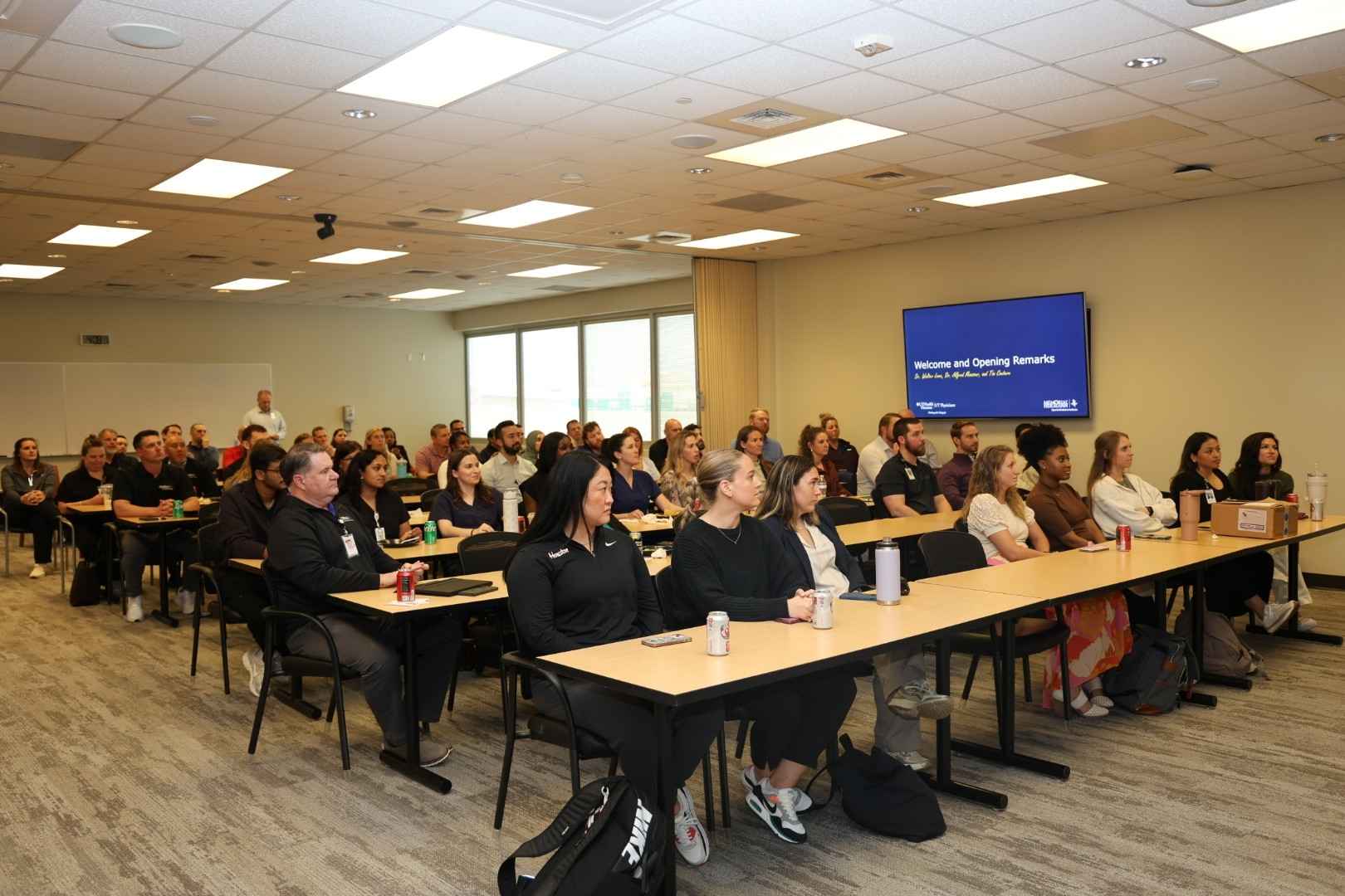 Physical therapists, rehabilitation specialists, and researchers from UTHealth Houston and Memorial Hermann, during the opening remarks at the Walter R. Lowe Knee Registry annual meeting.