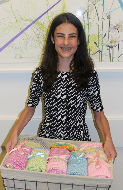 Former NICU patient Hannah Fox, 13, delivers handmade blankets to Children’s Memorial Hermann Hospital