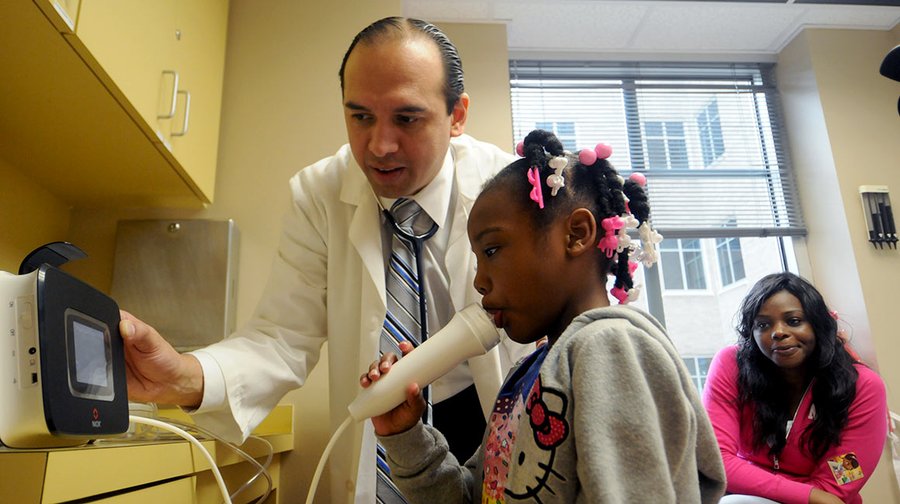 Dr. Mosquera with patient