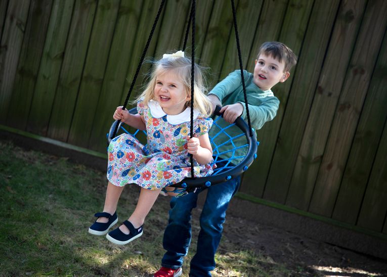Thanks to their hearing aids and the expert care of UT Physicians specialists, Elizabeth and Elliott Maddox are now thriving. (Photo by Alyssa Duty/UT Physicians)