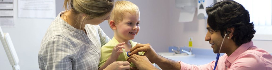 Pediatrician with patient