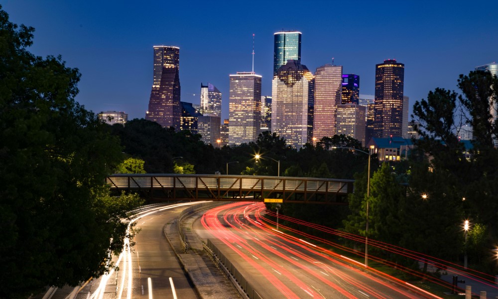 City of Houston skyline and freeway at night