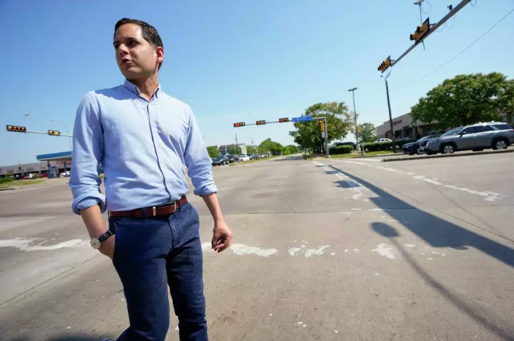 Dr. Hafeez walks on a Houston street during interview.