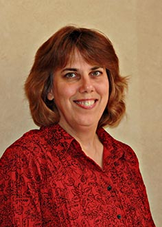 Professional headshot of Dr. Joan Purcell.