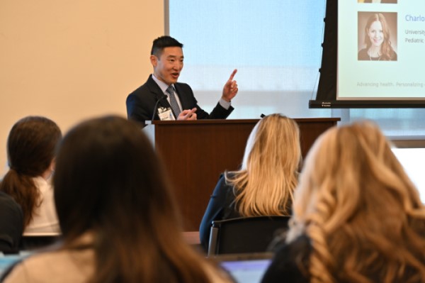 Dr. Chang presenting at symposium