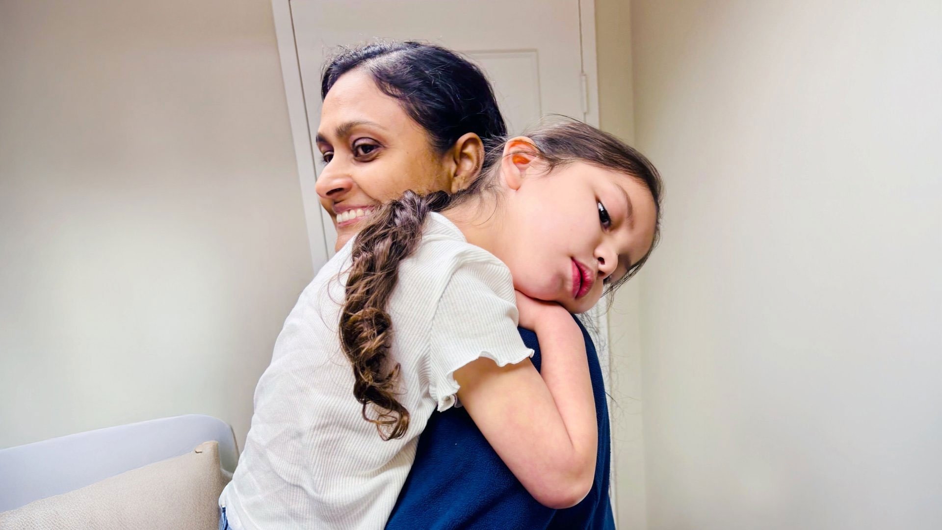 Doctor holding young patient