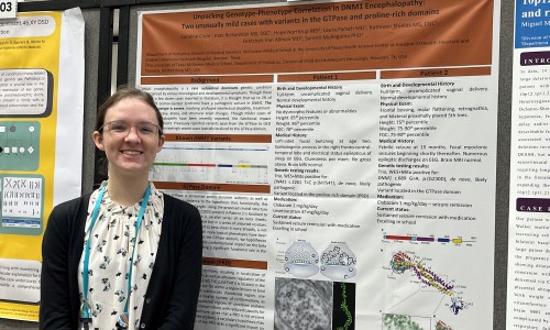 Woman standing in front of research poster