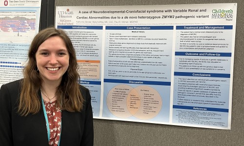 Woman standing in front of research poster