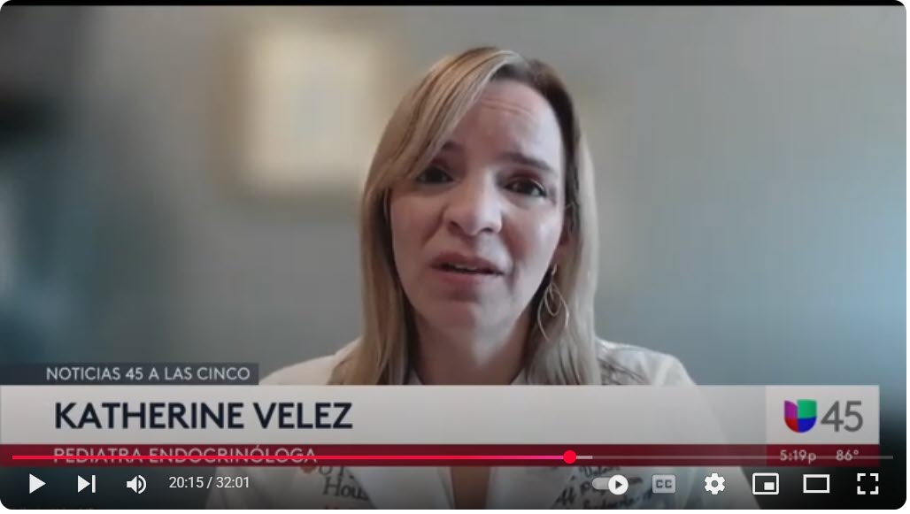 Woman speaking on the news