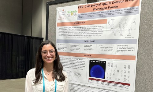 Woman standing in front of research poster