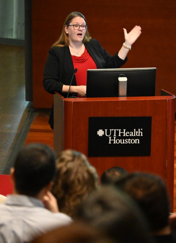 Dr. McKay presenting at podium