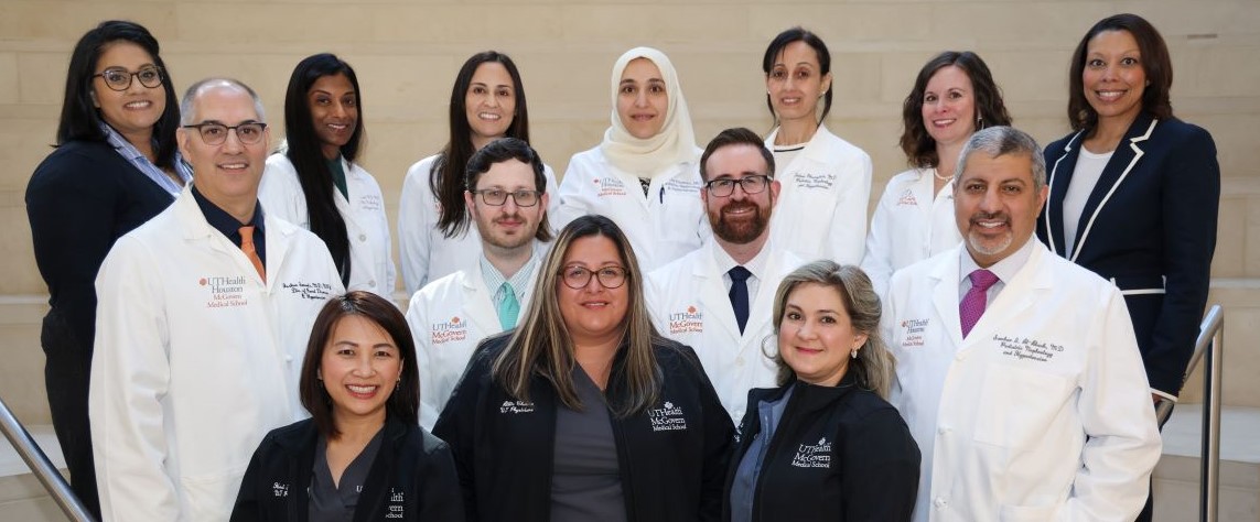 Doctors and nurses standing on steps