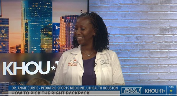 Doctor on camera in news studio
