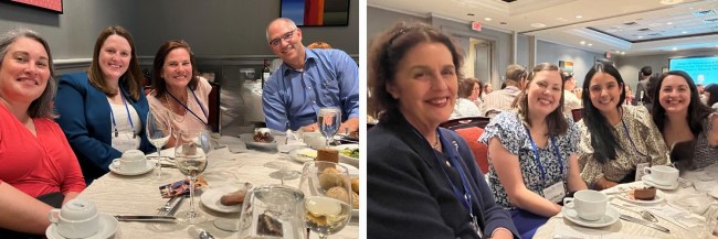 People smiling around a dinner table