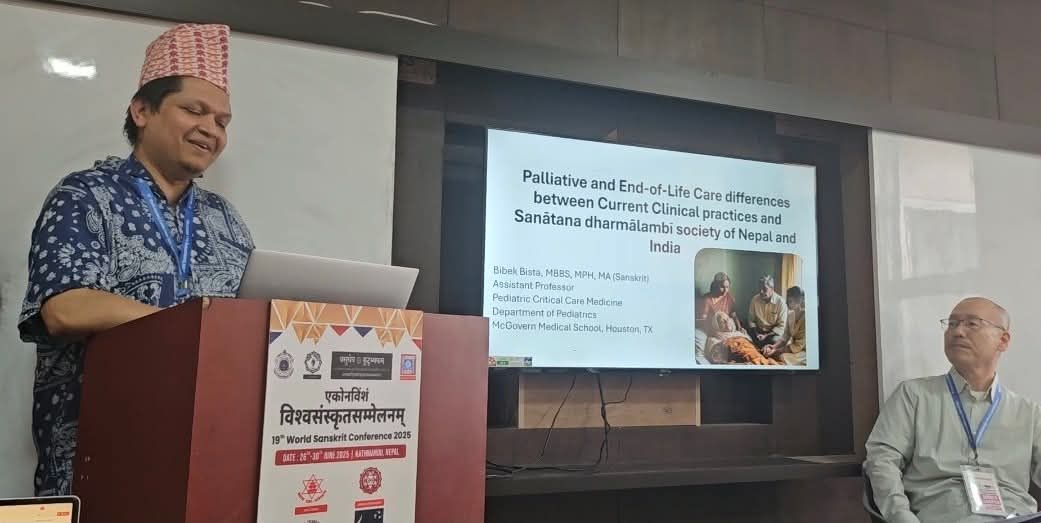 Dr. Bista at podium