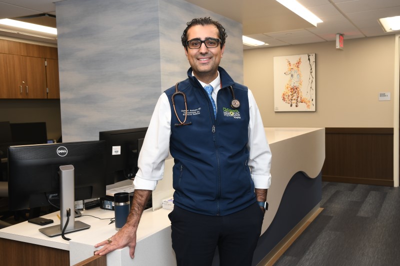 Dr. Anzueto standing at front desk